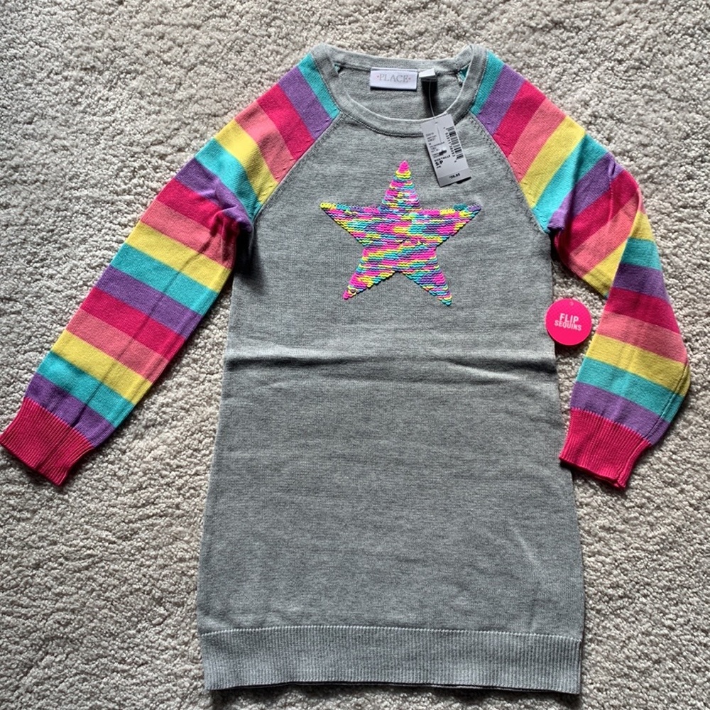 New with tags! Knit grey dress. Reversible sequins star with colorful sleeves